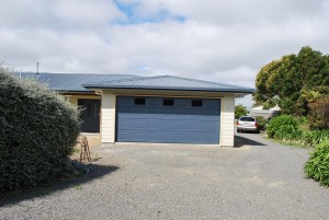 The garage is pretty well finished except for paint... and that's left for us to do!